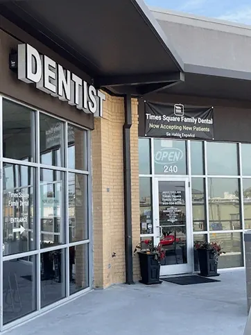 The entrance to Times Square Family Dental under the covered walkway.